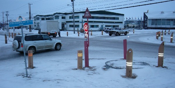pedestrian walkway posts  
installed around the 4-corners
intersection